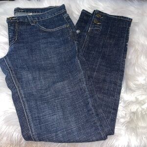 Bebe straight leg jeans with button details at bottom